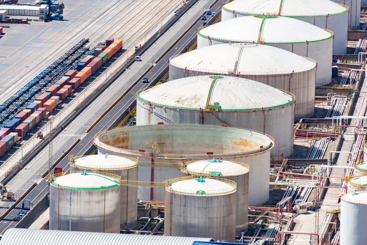 Fuel storage tanks beside a railway line