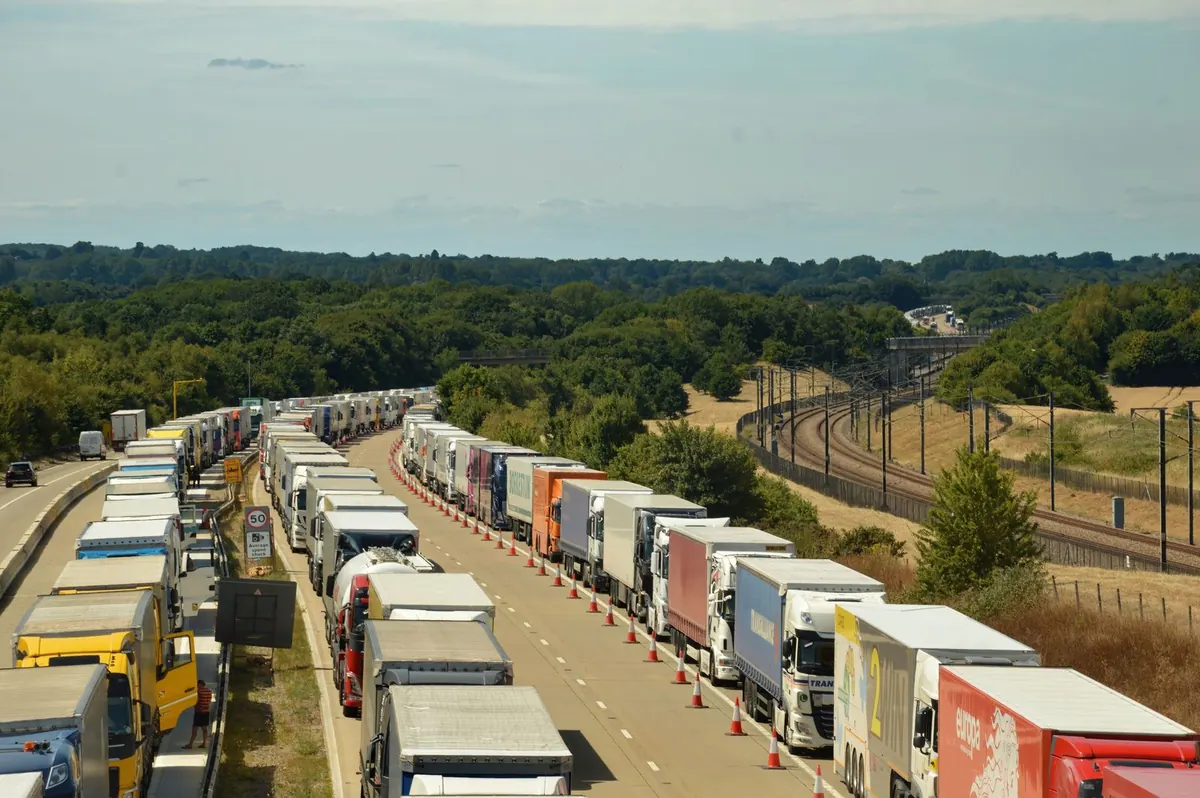 Line of freight trucks on a highway
